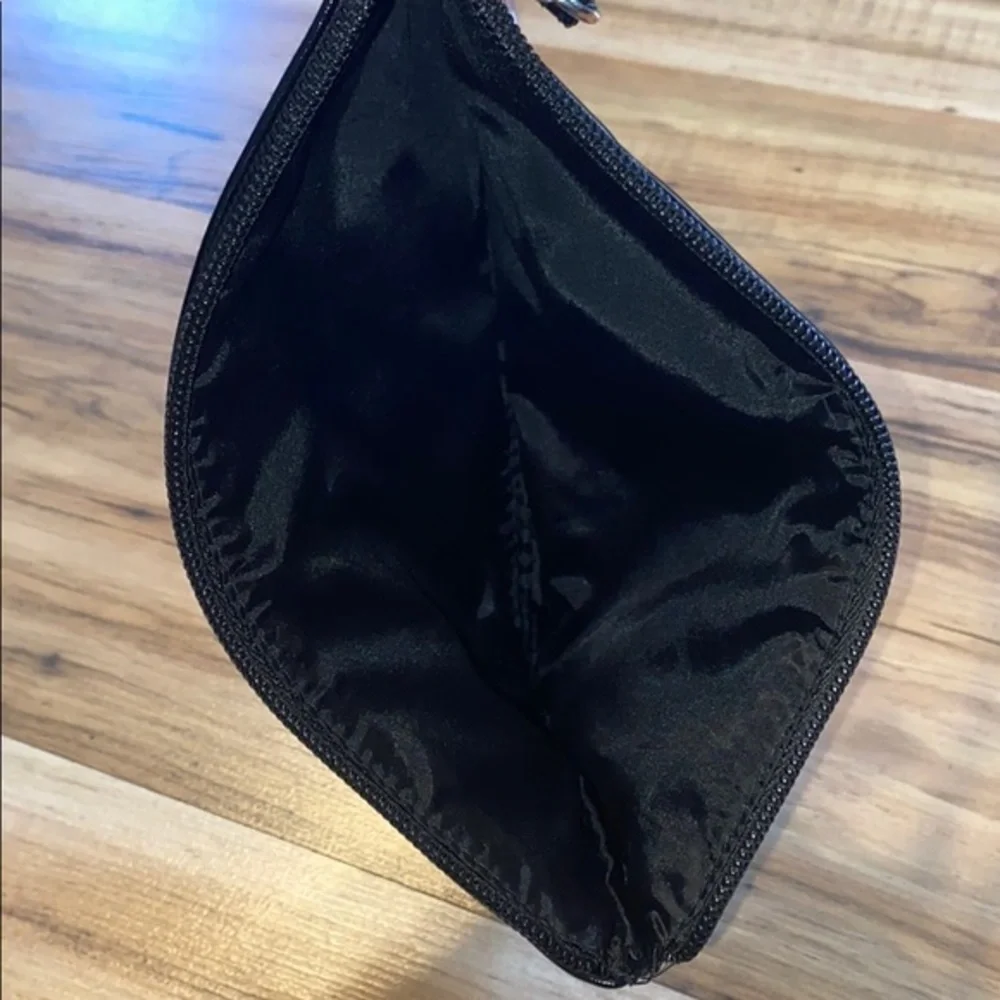 Victoria’s Secret Wristlet Movable Confetti Sequins